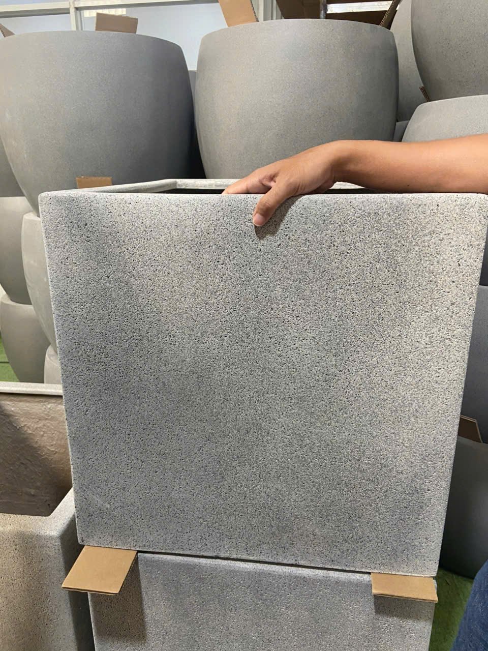 Planters stacked with protective corners for export