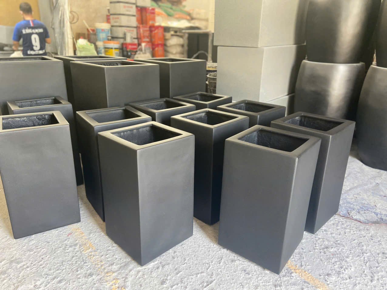 Square and tall fiberglass planters for commercial projects